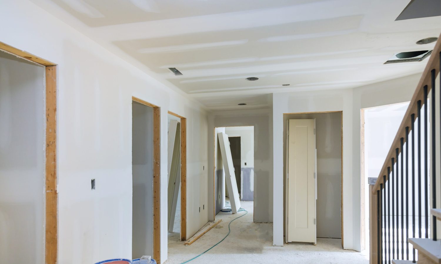 Construction building industry new home construction interior drywall tape and finish details installed door for a new home before installing