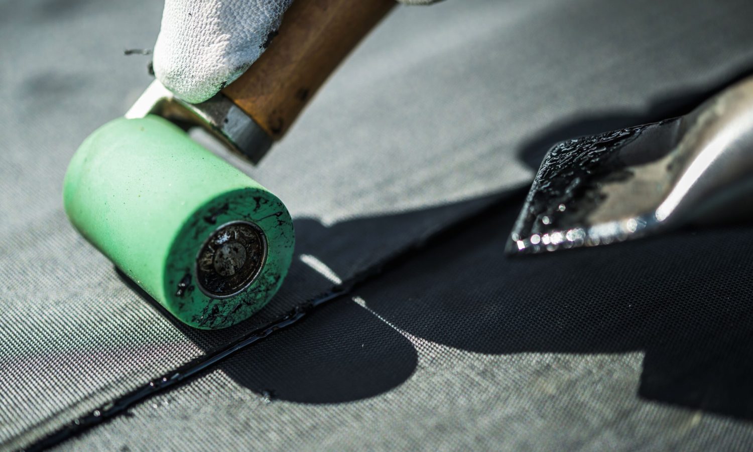 Roof Rubber EPDM Membrane Installation Close-Up. Roofing Industry Theme.